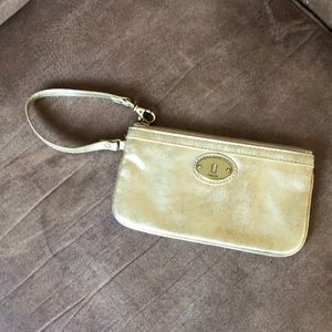 Gold fossil wristlet